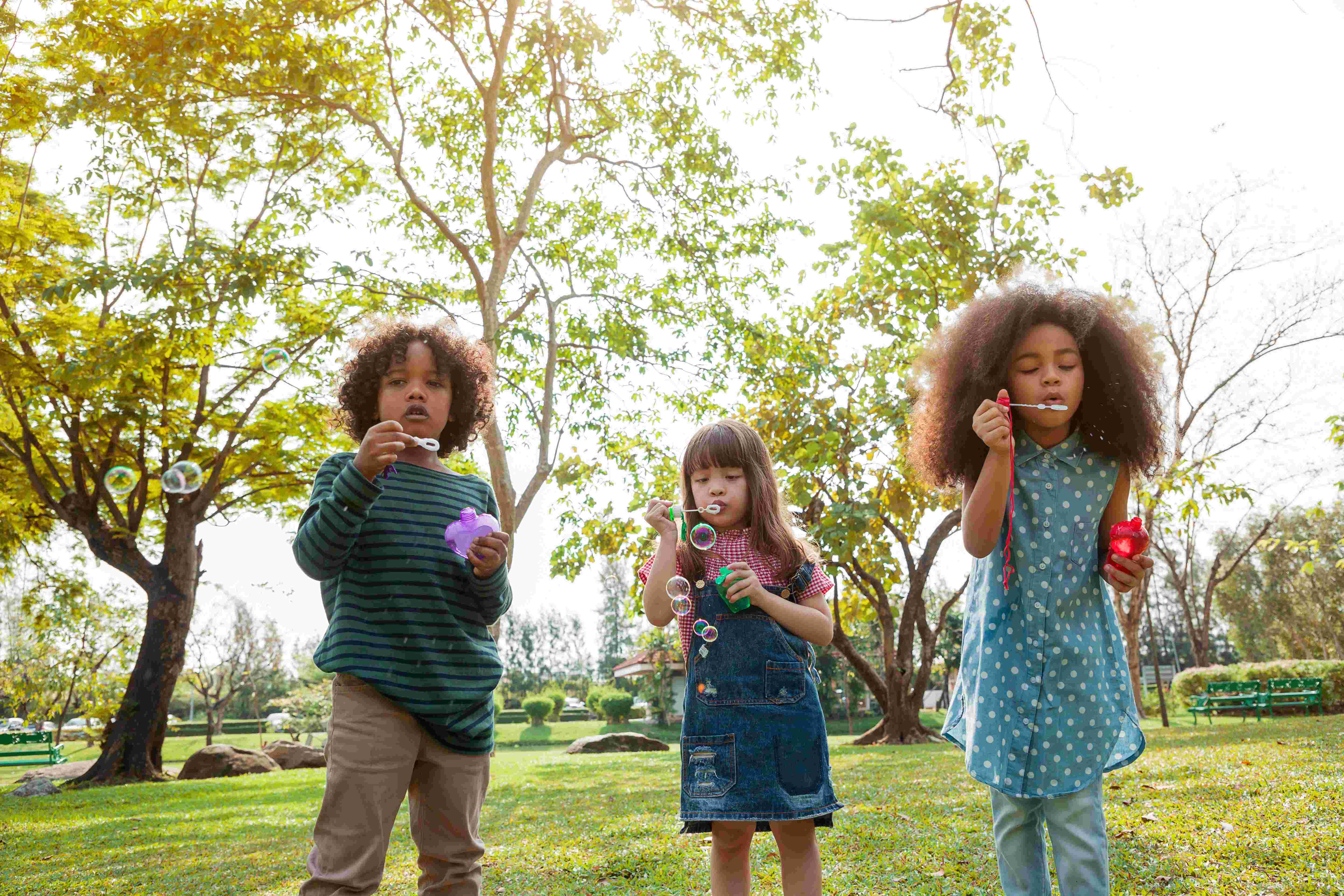 children playing with bubbles