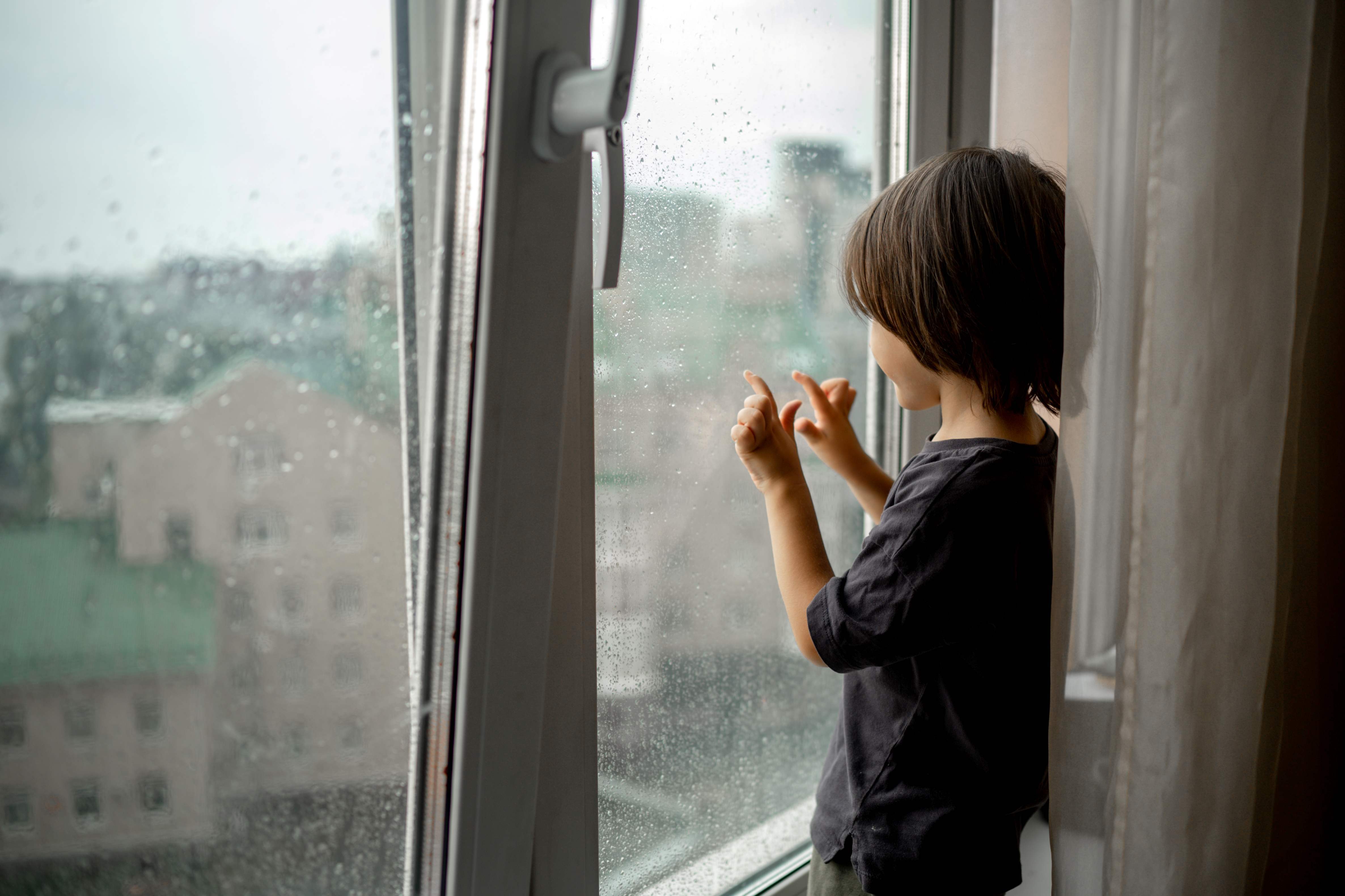 child bored of rain, trying rainy day activities